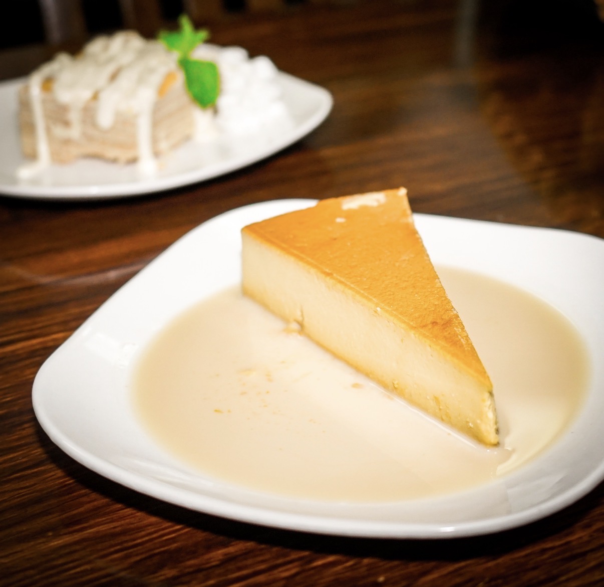 Flan Napolitano with cream sauce, served with carlota.